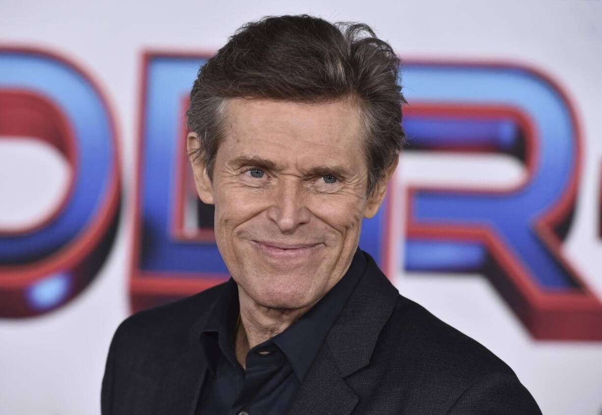 FILE - Willem Dafoe arrives at the premiere of "Spider-Man: No Way Home" at the Regency Village Theater on Monday, Dec. 13, 2021, in Los Angeles. Dafoe is set to receive an honorary doctorate from the University of Wisconsin-Milwaukee next month, university officials announced Friday, April 29, 2022.