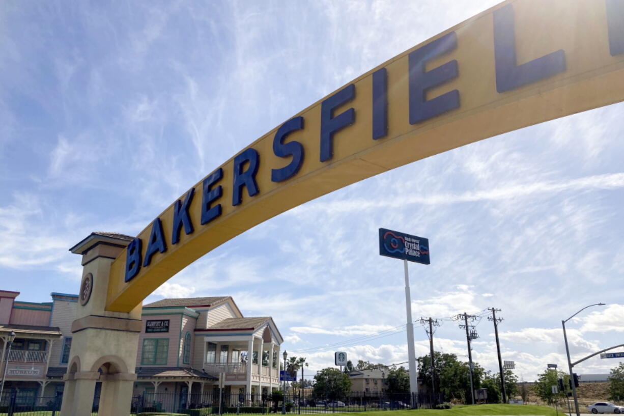 A sign for Bakersfield, Calif., is displayed over Sillect Avenue at Buck Owens Drive on April 20, 2022. House Republican leader Kevin McCarthy is a son of California's Central Valley, a farming and oil-pumping heartland. It's a swath of rural conservatism amid California's progressive politics and it's Donald Trump's slice of California. It's here that McCarthy launched his political rise.