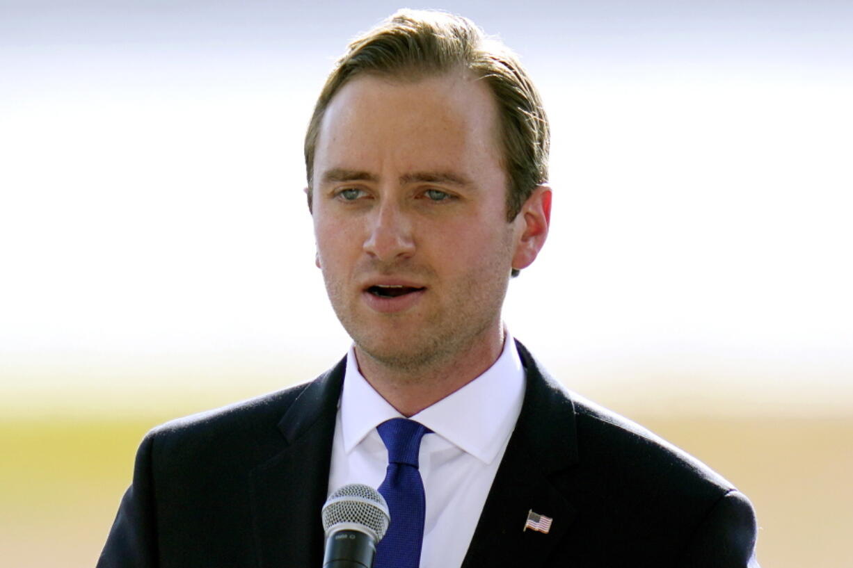 FILE - Matt Mowers speaks before a campaign rally for President Donald Trump at Manchester-Boston Regional Airport in Londonderry, N.H., Aug. 28, 2020. The former Trump administration official who is now running for Congress in New Hampshire voted twice during the 2016 primary election season. Legal experts say that could be a violation federal voter fraud law.