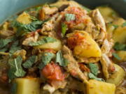 This image released by Milk Street shows a recipe for Cape Malay Chicken Curry.