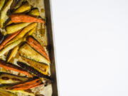 This image released by Milk Street shows a recipe for roasted carrots with the turmeric-infused honey.