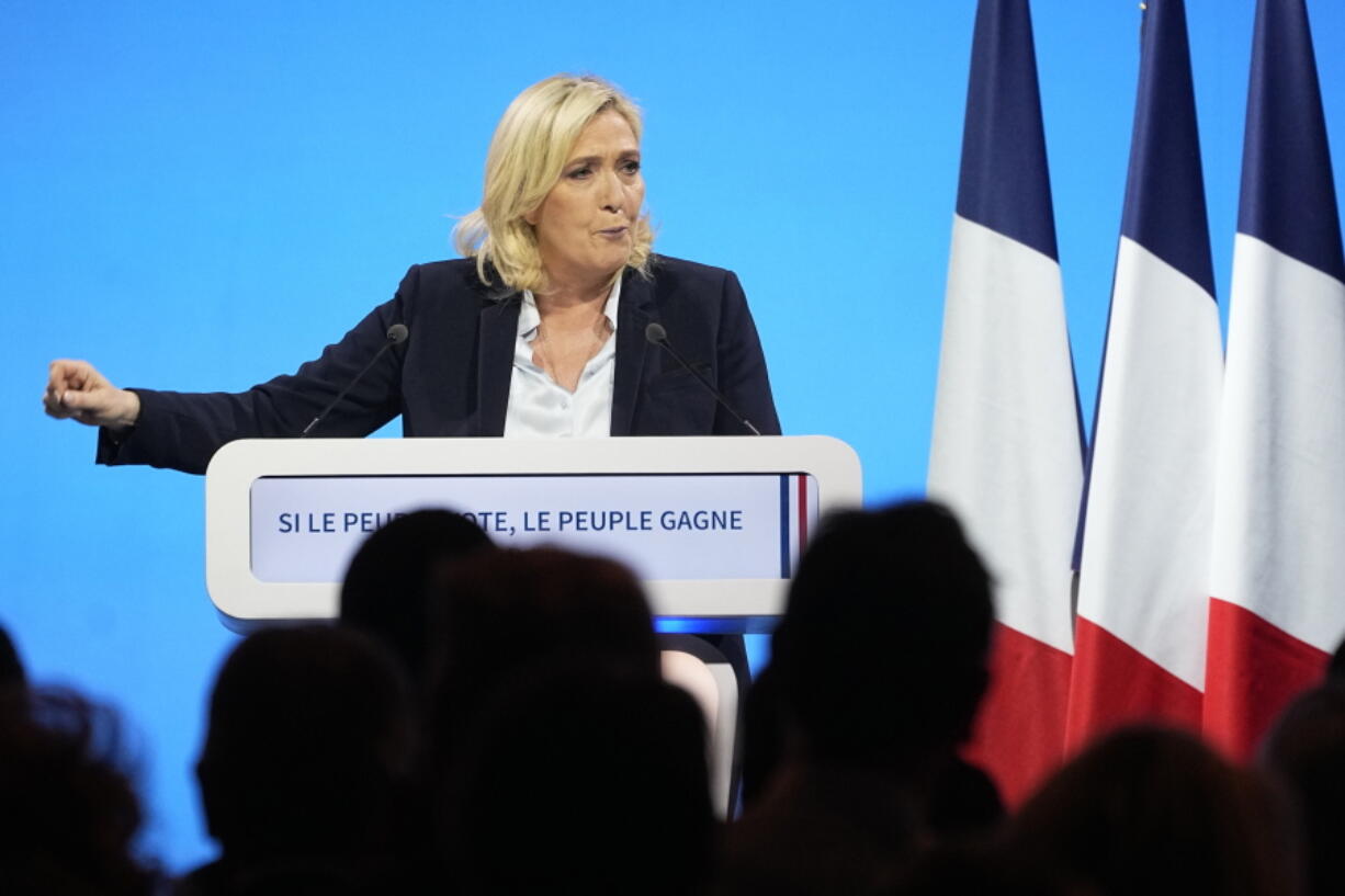 French far-right presidential candidate Marine Le Pen delivers her speech during a campaign rally in Aras, northern France, Thursday, April 21, 2022. Marine Le Pen is facing off against French President Emmanuel Macron and centrist candidate for the reelection in France's April 24 presidential runoff.