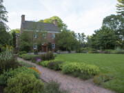 This image provided by Mt. Cuba Center shows the formal native plant garden blooming at the botanical garden, located in Hockessin, Del. Plantings depicted are: Amsonia tabernaemontana 'Storm Cloud', Asclepias tuberosa, Coreopsis verticillata 'Crazy Cayenne', Gillenia trifoliata 'Pink Profusion', Monarda didyma 'AChall', Penstemon 'Dark Towers', Physocarpus opulifolius 'SMPOTW', Rudbeckia maxima, Sisyrinchium angustifolium 'Lucerne', Solidago sphacelata 'Golden Fleece' and Symphyotrichum oblongifolium 'October Skies'. (Alessandra N. Stokley/Mt. Cuba Center via AP) (Debbie Roos/N.C.