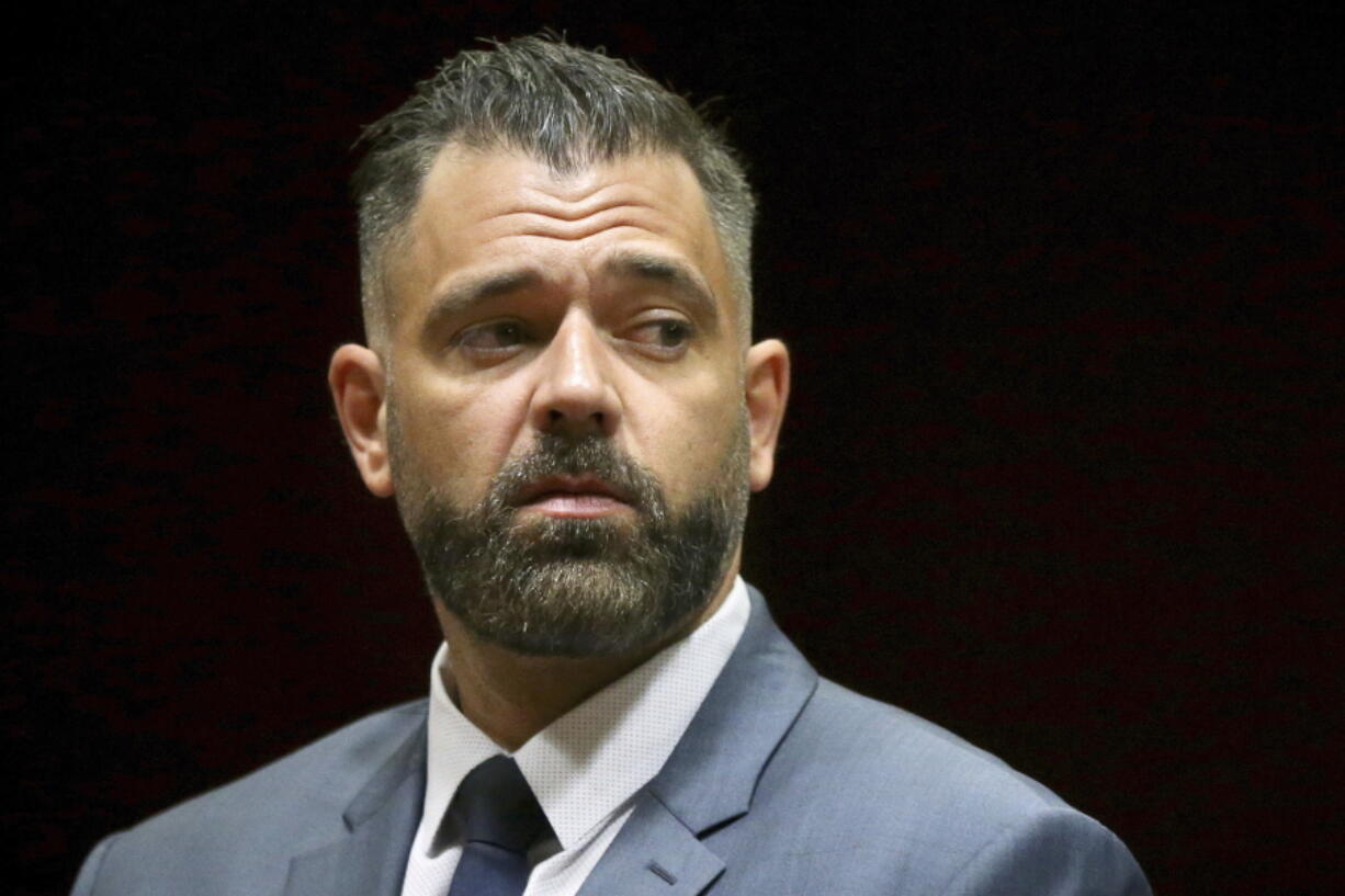 FILE - In this May 28, 2019, photo, Mark D'Amico stands during his arraignment to charges including theft by deception at Burlington County Superior Court in Mount Holly, N.J. D'Amico, who conspired with his former girlfriend to cook up a feel-good story about a helpful homeless man and then used the lie to raise hundreds of thousands of dollars in donations online has been sentenced in federal court. D'Amico received a 27-month term on Friday, April 1, 2022.