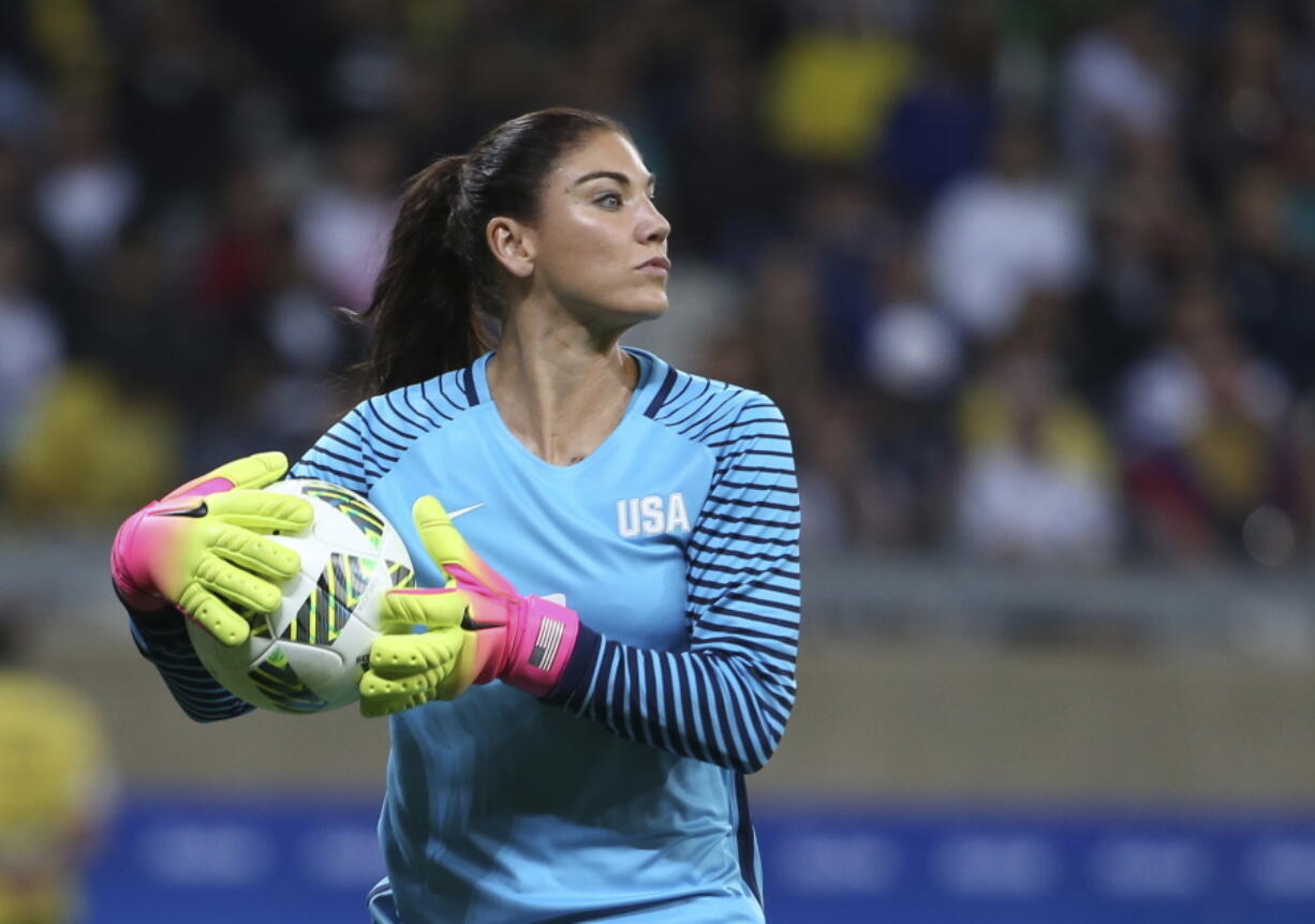 Former U.S. women's national team star goalkeeper Hope Solo was arrested after police say she was found passed out behind the wheel of a vehicle in North Carolina with her two children inside. A police report said Solo was arrested on Thursday, March 31, 2022, in a shopping center parking lot in Winston-Salem and charged with driving while impaired, resisting a public officer and misdemeanor child abuse.