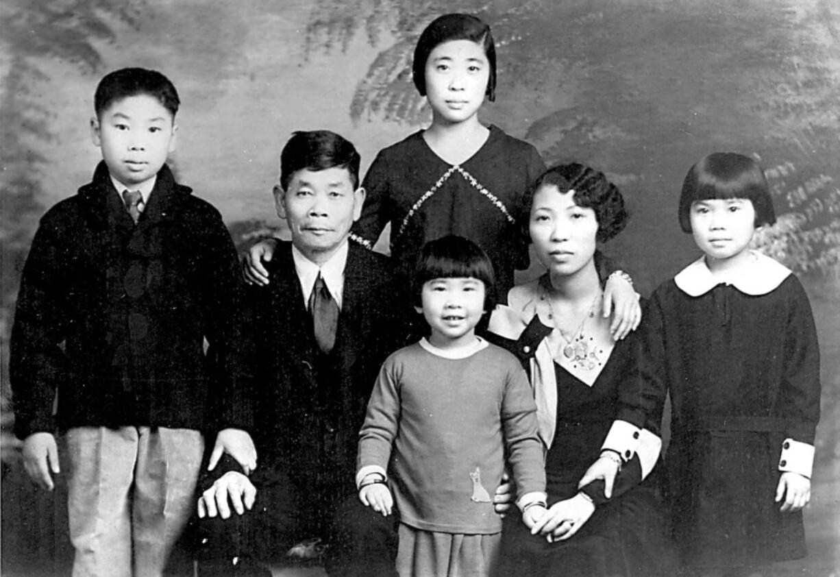 The well-dressed Kong Loy family sits for a portrait in this undated photo. Left to right are Percy, Kong (father), Pearl, Rose (mother), Margaret (Peggy) and the youngest Priscilla stands in front.