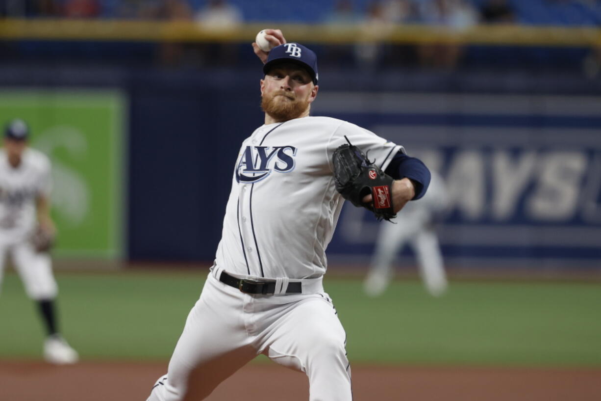 Tampa Bay Rays starting pitcher Drew Rasmussen works from the mound against the Seattle Mariners during first inning of a baseball game Wednesday, April 27, 2022, in St. Petersburg, Fla.