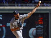 Seattle Mariners starting pitcher Robbie Ray (38) throws against the Minnesota Twins in the second inning of a baseball game, Friday, April 8, 2022, in Minneapolis.