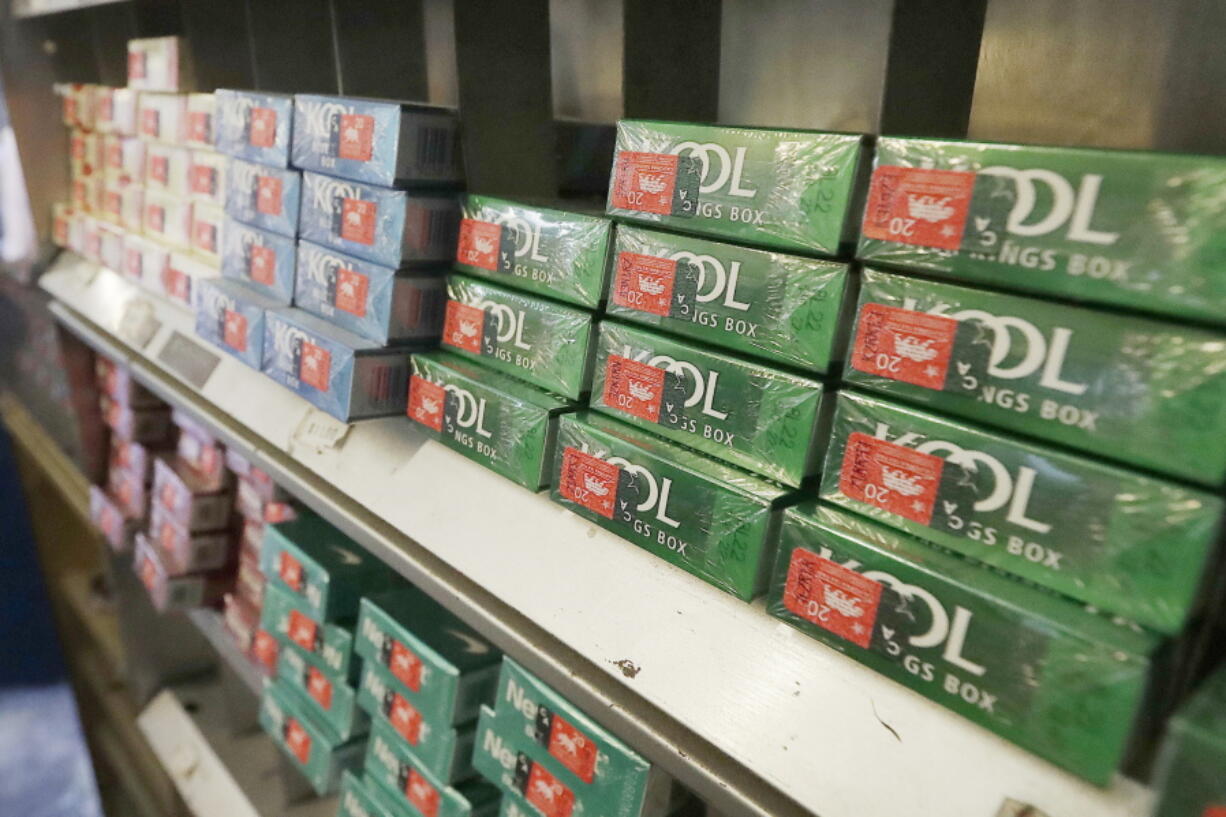 FILE - Menthol cigarettes and other tobacco products are displayed at a store in San Francisco on May 17, 2018. The U.S. government is set to release its long-awaited plan to ban menthol cigarettes and flavored cigars. On Thursday, April 28, 2022, Food and Drug Administration Commissioner Robert Califf previewed the announcement in congressional testimony, saying the proposal would reduce disease and death among smokers and help many quit.