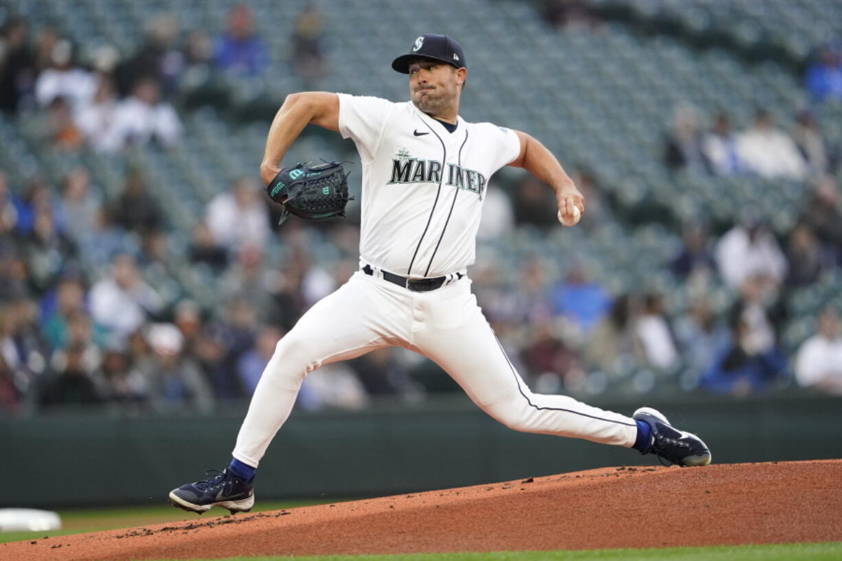 Seattle Mariners starting pitcher Robbie Ray throws to a Texas Rangers batter during the first inning of a baseball game Tuesday, April 19, 2022, in Seattle. (AP Photo/Ted S.