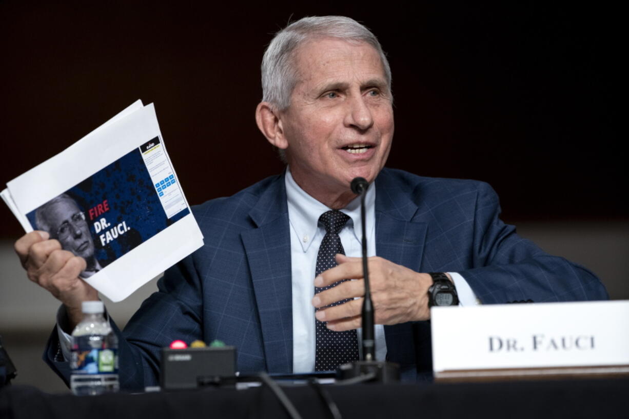 FILE - Dr. Anthony Fauci, director of the National Institute of Allergy and Infectious Diseases and chief medical adviser to the president, speaks during a Senate Health, Education, Labor, and Pensions Committee hearing Tuesday, Jan. 11, 2022 on Capitol Hill in Washington. Speaking Tuesday night, April 26, 2022, on PBS' "NewsHour," Fauci said the global pandemic isn't over but the U.S. currently is "out of the pandemic phase." But it doesn't mean the coronavirus threat to Americans has ended.