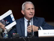 FILE - Dr. Anthony Fauci, director of the National Institute of Allergy and Infectious Diseases and chief medical adviser to the president, speaks during a Senate Health, Education, Labor, and Pensions Committee hearing Tuesday, Jan. 11, 2022 on Capitol Hill in Washington. Speaking Tuesday night, April 26, 2022, on PBS' "NewsHour," Fauci said the global pandemic isn't over but the U.S. currently is "out of the pandemic phase." But it doesn't mean the coronavirus threat to Americans has ended.