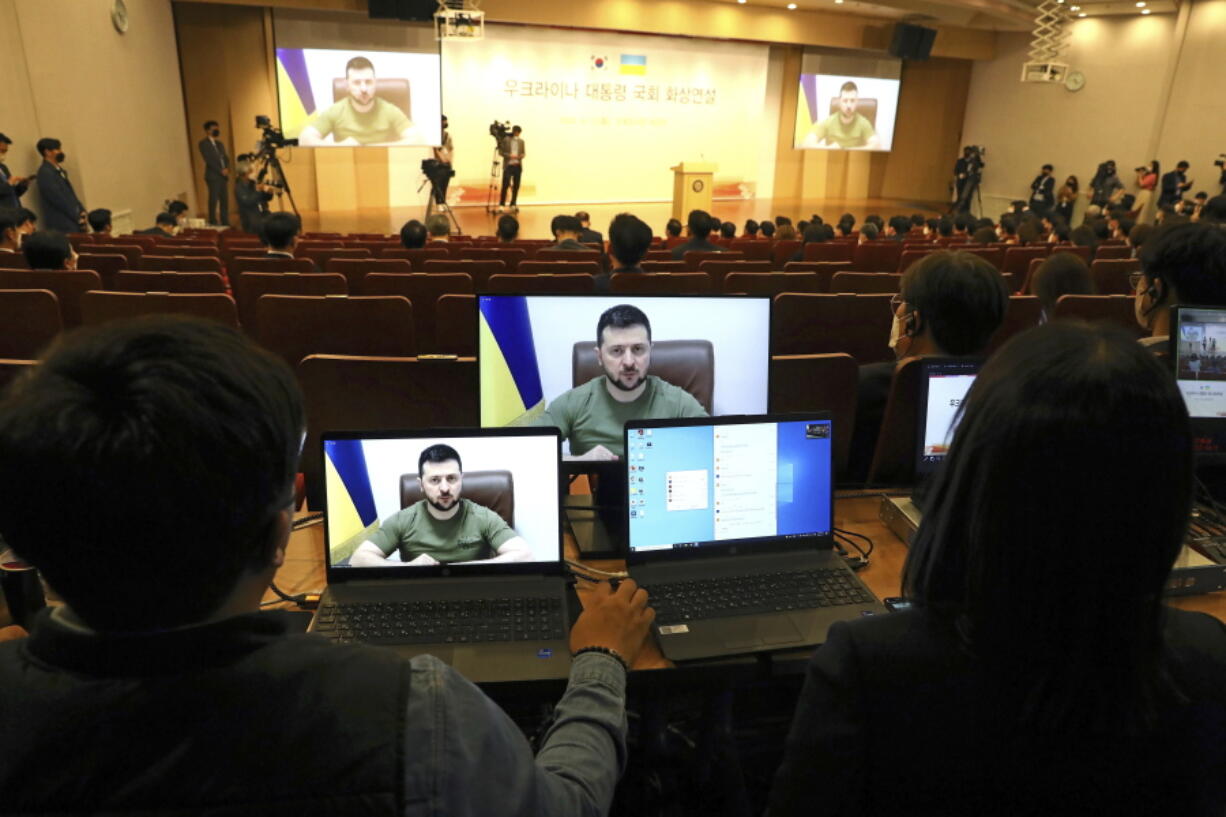 Ukrainian President Volodymyr Zelenskyy addresses members of the South Korea Parliament via video link at the National assembly on Monday, April 11, 2022 in Seoul, South Korea. Zelenskyy called for South Korea to provide his country with military arms to help it fight back against the Russian invasion.