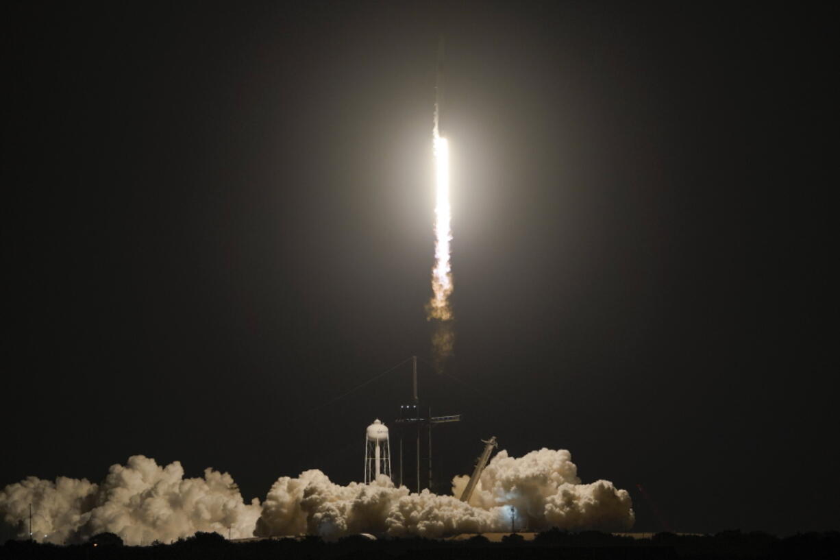 A SpaceX Falcon 9 rocket lifts off from pad 39A at the Kennedy Space Center in Cape Canaveral, Fla., Wednesday, April 27, 2022. NASA astronauts Kjell Lindgren, Robert Hines, and Jessica Watkins, and European Space Agency astronaut Samantha Cristoforetti on the Crew Dragon spacecraft begin a six-month expedition on the International Space Station.