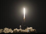 A SpaceX Falcon 9 rocket lifts off from pad 39A at the Kennedy Space Center in Cape Canaveral, Fla., Wednesday, April 27, 2022. NASA astronauts Kjell Lindgren, Robert Hines, and Jessica Watkins, and European Space Agency astronaut Samantha Cristoforetti on the Crew Dragon spacecraft begin a six-month expedition on the International Space Station.