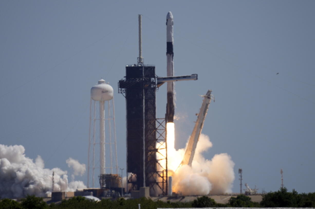 A SpaceX Falcon 9 rocket with the Crew Dragon capsule attached, lifts off with the first private crew from Launch Complex 39A Friday, April 8, 2022, at the Kennedy Space Center in Cape Canaveral, Fla. .