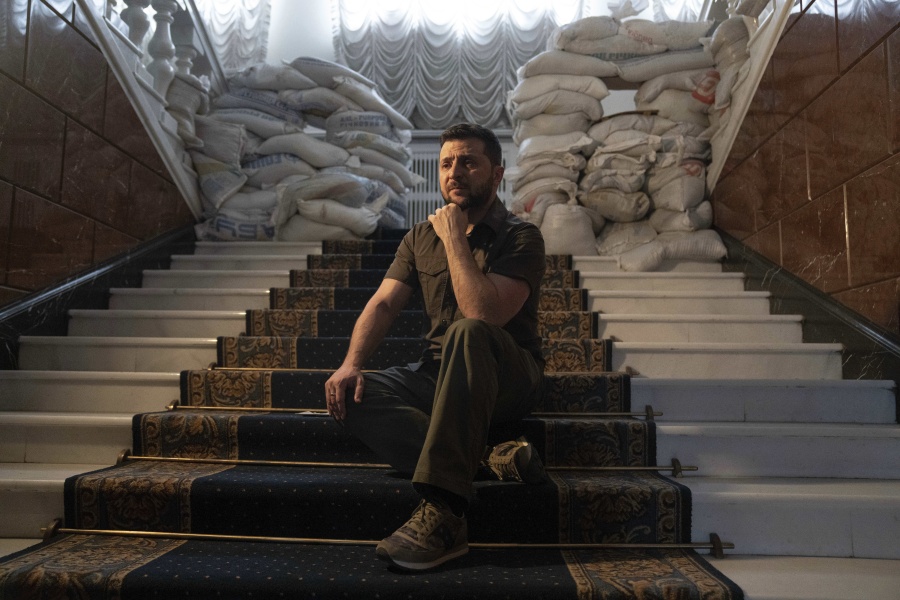 Ukrainian President Volodymyr Zelenskyy speaks during an interview with The Associated Press in his office in Kyiv, Ukraine, Saturday, April 9, 2022. Ukrainian President Volodymyr Zelenskyy says he's committed to pressing for peace despite Russian attacks on civilians that have stunned the world.