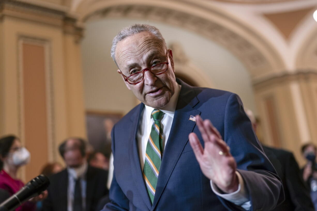 Senate Majority Leader Chuck Schumer, D-N.Y., meets with reporters following a Democratic Caucus meeting, at the Capitol in Washington, Tuesday, April 5, 2022. (AP Photo/J.