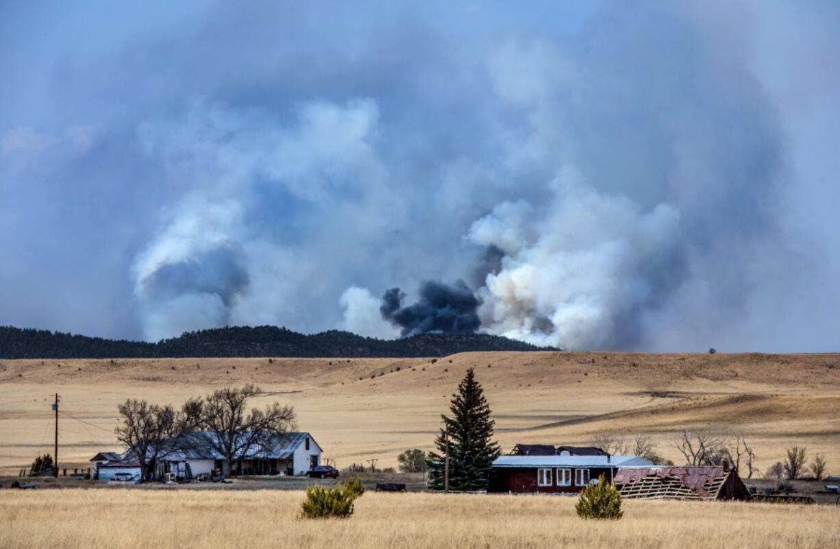 The Calf Canyon Fire burns north of Las Vegas near the San Miguel and Mora County line Monday April 25, 2022.