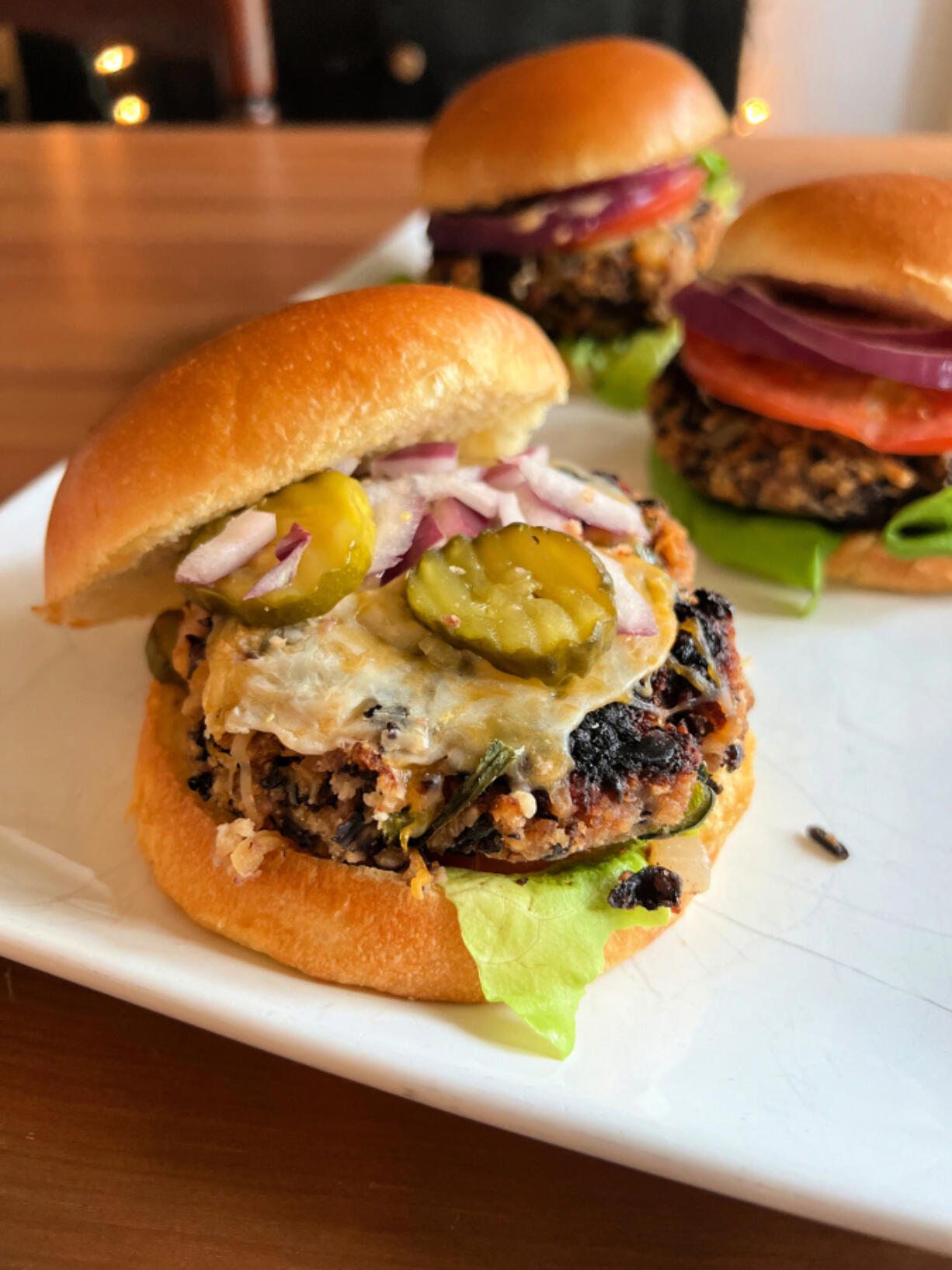 Roasted black beans and toasted cashews team up with chipotle chili pepper to create this really awesome veggie burger.