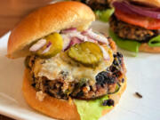 Roasted black beans and toasted cashews team up with chipotle chili pepper to create this really awesome veggie burger.