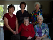 Pat Anderson, 89, far right, leads the Sisterhood of the Boobless Wonders, a group of seven senior lady knitters who are all breast cancer survivors. Together, these local women hand-knit breast-shaped yarn pillowlike prosthetics for women who have had mastectomies. Pictured from left, top to bottom: Pat Hamada 87, Jan Rillie, 70, K.J. Koljonen, 67, Pat Anderson, 89, and Pat Moller, 84.