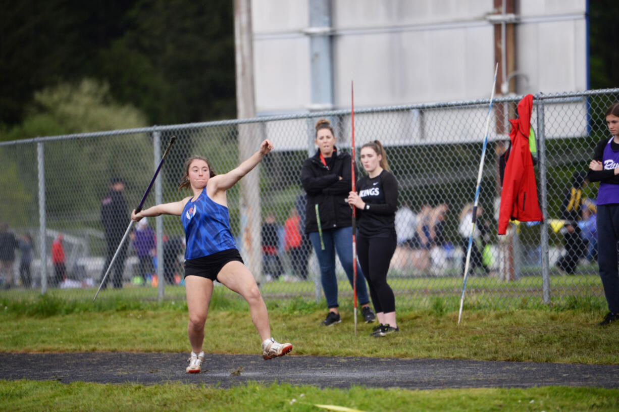 Ridgefield?s Kelli Krsul throws the javelin at the Spudder Track and Field Classic. The three-sport standout is completing her prep sports career with hopes of reaching the state meet.