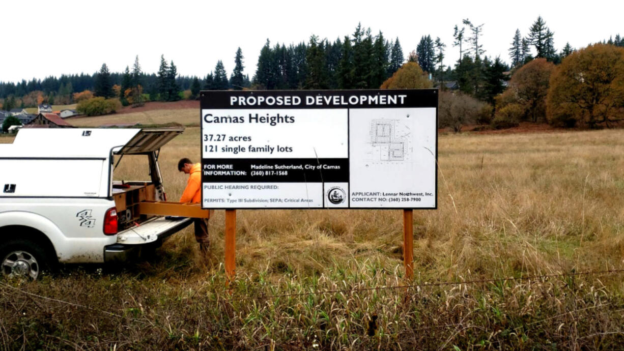 A sign, proposing a subdivision with 122 single-family homes, sits on a 37-acre parcel at 26630 N.E. 28th St., in north Camas, in 2021.