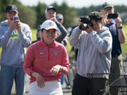 Supporters cheer for Union junior Jade Gruher after she was announced as the individual champion of the Class 4A girls golf tournament on on Wednesday, May 25, 2022, at Hawks Prairie Golf Course in Lacey.