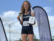 Former Prairie High School track star Valerie Schmidt holds her first-place medal after winning the heptathlon at the 2022 NAIA Outdoor Track and Field Championships on May 26 in Gulf Shores, Alabama.