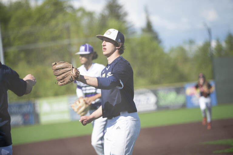 Dax Clifton of Seton Catholic comes off the field for the National League all-stars during the Clark County High School Senior All-Star baseball series at the Ridgefield Outdoor Recreation Center on Tuesday, May 31, 2022.