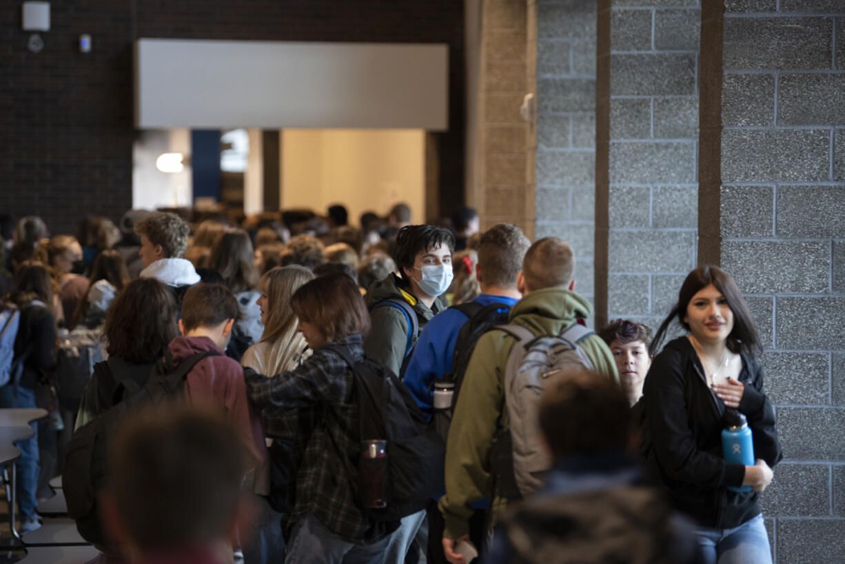 A crowd of students walk through the school's cafeteria to head toward their first class at View Ridge Middle School on May 4. The proposed levy wouldn't fund construction projects, rather it would provide funding for critical health services and student extracurricular programs.