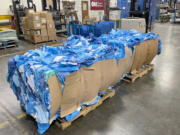 One thousand pounds of baled surgical blue wrap is prepared to be recycled. The material can be reused as hospital gowns, plastic washbasins and more.