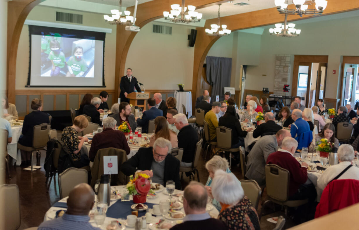 Maj. Jonathan Harvey speaks to a crowded Sequoia Room at The Salvation Army Vancouver Corps 2022 Love Beyond Community Luncheon on Wednesday at Royal Oaks Country Club. The event was the first in-person event held by the organization in more then two years due to the COVID-19 pandemic. More than 100 people attended. Money raised by ticket sales for the event exceeded $70,000 -- considerably surpassing the $10,000 the organization hoped to raise during the luncheon.