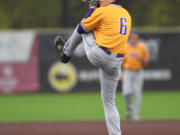 Columbia River's Zach Ziebell winds up Friday, May 13, 2022, during River’s 5-2 win against Tumwater in the 2A District Championship at Ridgefield Outdoor Recreation Center.