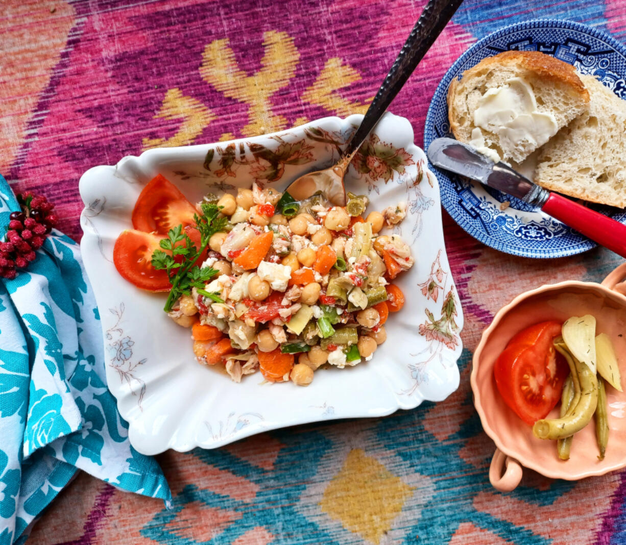 With chickpeas, tuna, feta, carrots, pickled beans and artichokes hearts, this salad has something for everyone.