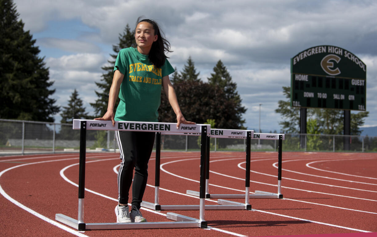 Evergreen High School senior hurdler Grace Twiss takes a break at her school?s track Monday afternoon, May 23, 2022.