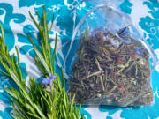 Try making fragrant sachets with herbs other than lavender by tying them in a tulle pouch. This is dried rosemary -- complete with blossoms.