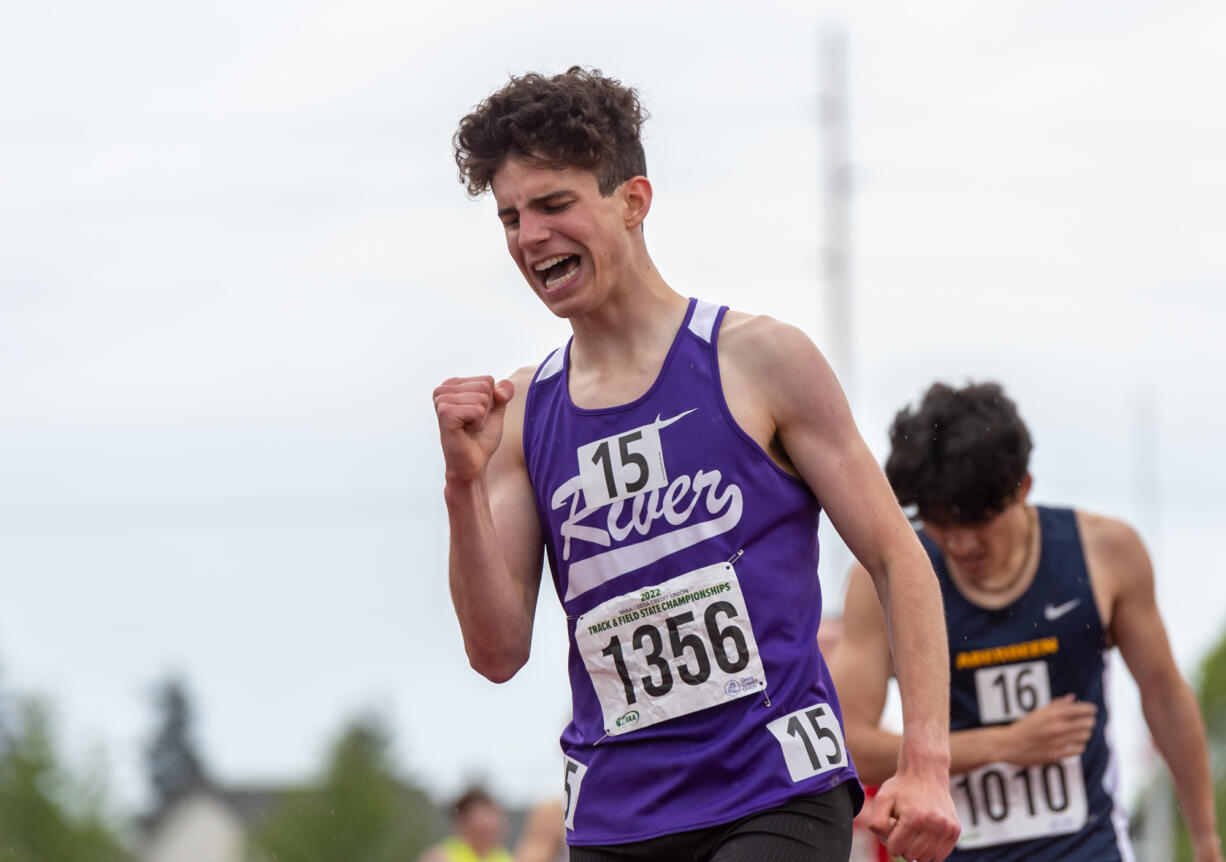 Columbia River's Daniel Barna pumps his fist after taking third in the 2A Boys 1600-meter run finals at the 2A/3A/4A State Track and Field Championships on Thursday, May 26, 2022, at Mount Tahoma High School in Tacoma.