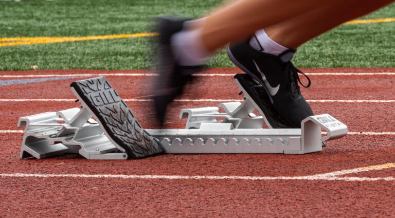 Columbia River's Gabrielle Gravel takes off from the blocks in a prelim of the 2A Girls 4x100 Relay prelims at the 4A/3A/2A State Track and Field Championships on Friday, May 27, 2022, at Mount Tahoma High School in Tacoma.