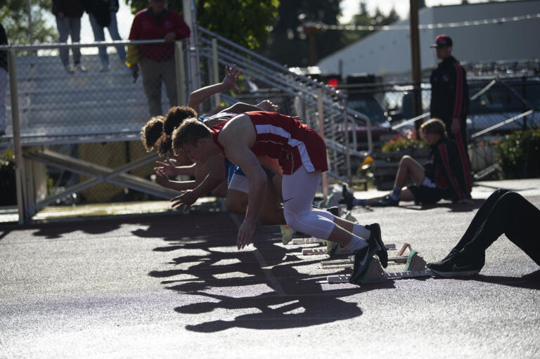 Runners break off the starting line in the boys 100 meters at the Class 1A District 4 track and field meet at Seton Catholic on Thursday, May 19, 2022.