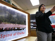 In this photo taken Oct. 6, 2010, teacher Jamie Valadez talks in her Port Angeles High School classroom about paddling on a native canoe journey, in Port Angeles, Wash. Valadez, a member of the Klallam tribe that has lived along the nearby Elwah River for centuries, brings tribal history alive in her classroom. She says the same experience can be had in any school in America, using the ready-made Native American curricula just waiting on the Web for interested teachers.