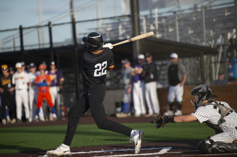 Prairie's Reece Walling lines a single into right during the Clark County All-Star Baseball series at the Ridgefield Outdoor Recreation Center on Tuesday, May 31, 2022.