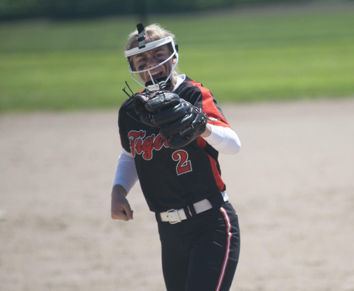 Battle Ground pitcher Rylee Rehbein points to catcher Kelly Monaghan after recording one of her 13 strikeouts in an 11-1 win over Graham-Kapowsin at the 4A bi-district softball tournament on Saturday, May 21, 2022.