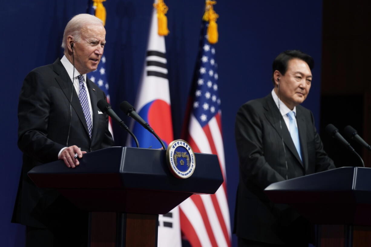 U.S. President Joe Biden, left, speaks as South Korean President Yoon Suk Yeol listens during a news conference at the People's House inside the Ministry of National Defense, Saturday, May 21, 2022, in Seoul, South Korea.