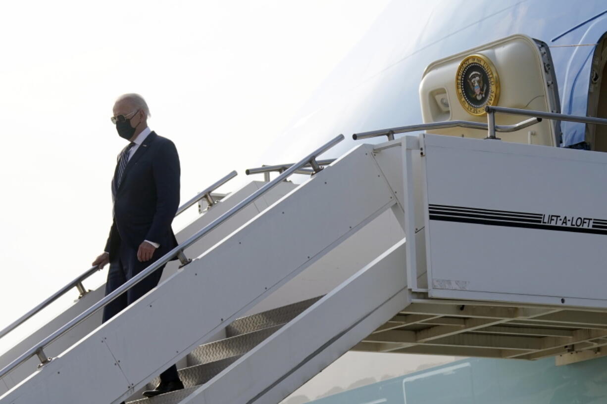 President Joe Biden exits Air Force One as he arrives at Osan Air Base, Friday, May 20, 2022, in Pyeongtaek, South Korea.