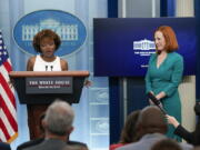 White House press secretary Jen Psaki, right, listens as incoming press secretary Karine Jean-Pierre speaks during a press briefing at the White House, Thursday, May 5, 2022, in Washington.