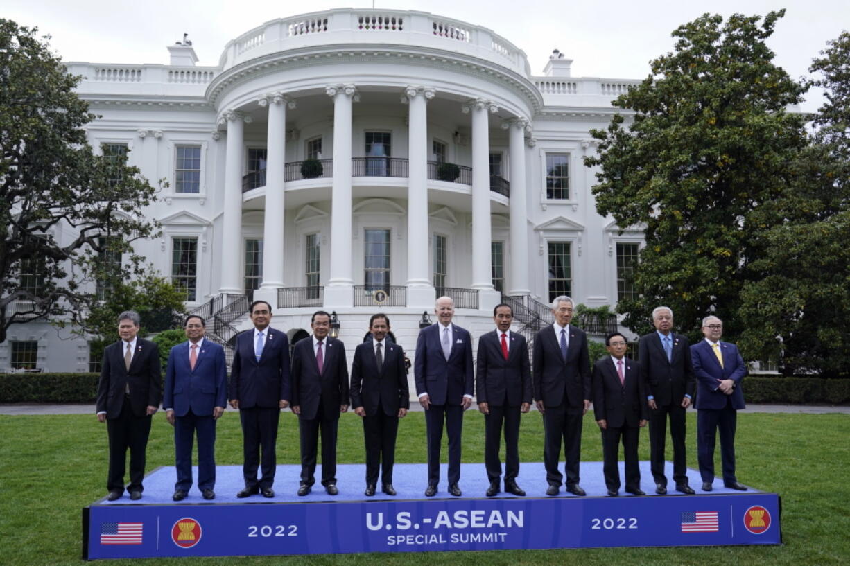 Leaders from the Association of Southeast Asian Nations (ASEAN) pose with President Joe Biden in a group photo on the South Lawn of the White House in Washington, Thursday, May 12, 2022. From left are, Secretary-General of the Association for Southeast Asian Nations Dato Lim Jock Hoi, Vietnamese Prime Minister Pham Minh Chinh, Thailand Prime Minister Prayut Chan-ocha, Cambodian Prime Minister Hun Sen, Sultan of Brunei Haji Hassanal Bolkiah, Biden, Indonesian President Joko Widodo, Singapore Prime Minister Lee Hsien Loong, Laos Prime Minister Phankham Viphavan, Malaysian Prime Minister Dato' Sri Ismail Sabri bin Yaakob and Philippines Foreign Affairs Secretary Teodoro Locsin Jr.