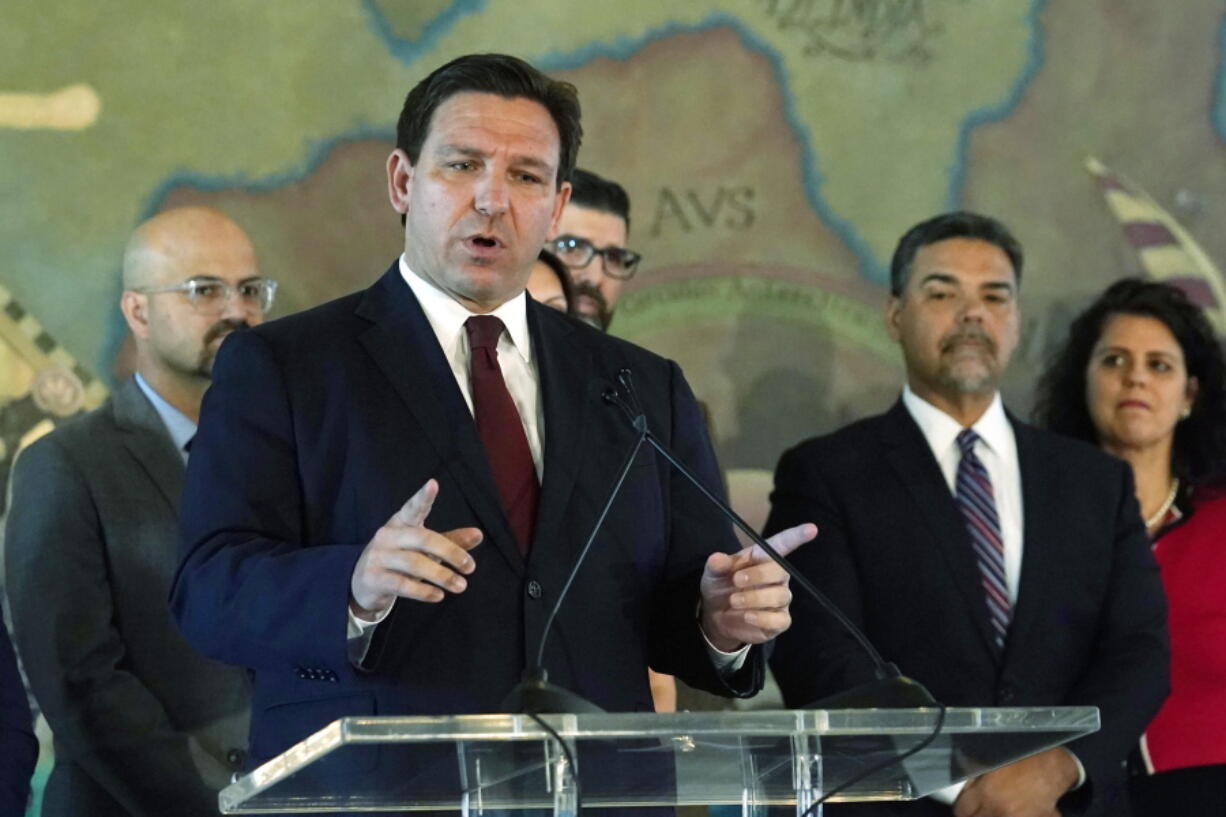 Florida Gov. Ron DeSantis speaks at Miami's Freedom Tower, Monday, May 9, 2022, in Miami. DeSantis approved two bills, one establishing November 7 as "Victims of Communism Day" and another bill to rename roads across the state for notable Cubans. The governor also announced that he will approve $25 million to renovate and restore the Freedom Tower.