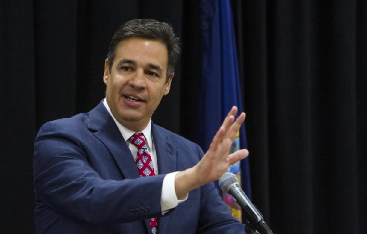 FILE - In this June 29, 2019 photo, Raul Labrador addresses members of the Idaho Republican Party at the Boise Centre in downtown Boise, Idaho. The former U.S. House member is running for state attorney general. Idaho's primary elections are Tuesday, May 17, 2022.